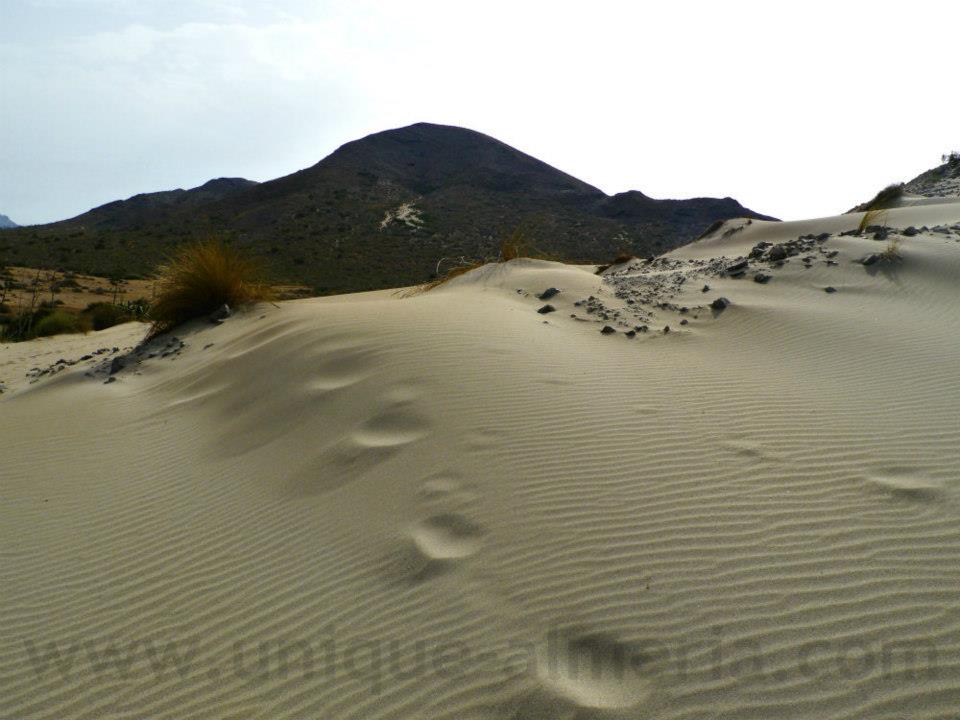 Climbing sand dunes on my way from Monsul to Barronal beach